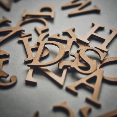 Wood alphabet and background material